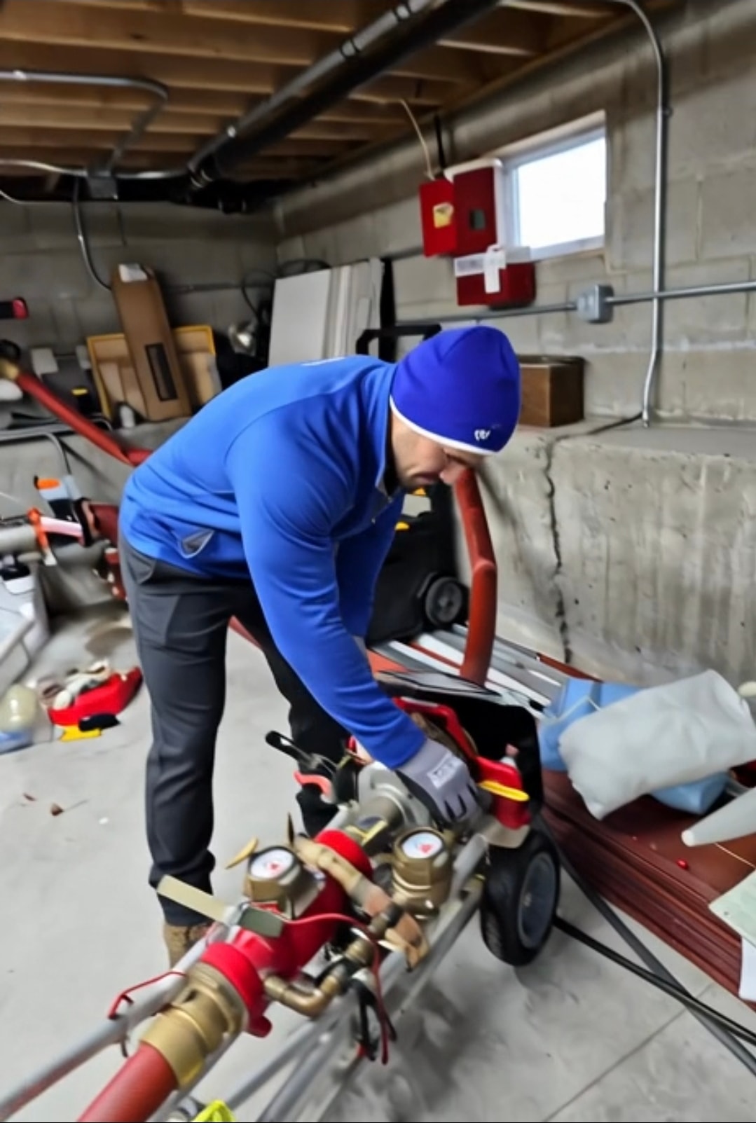 Pipe Doctor technician operating water meter testing equipment on-site